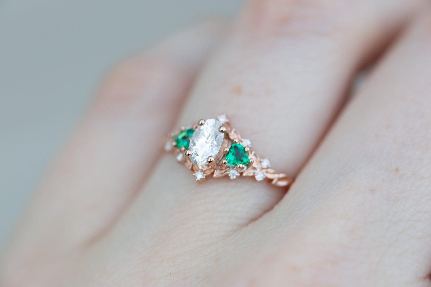 Briar rose three stone with oval moissanite and lab emerald (fairy queen ring)