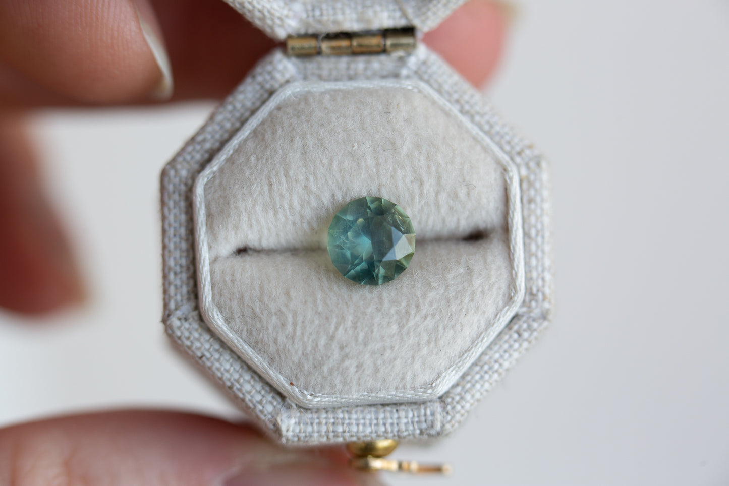 1.51ct round rare opalescent teal blue sapphire