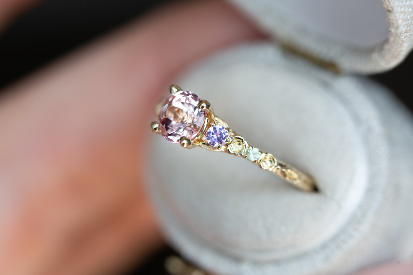 The Rosa setting with lab peach sapphire