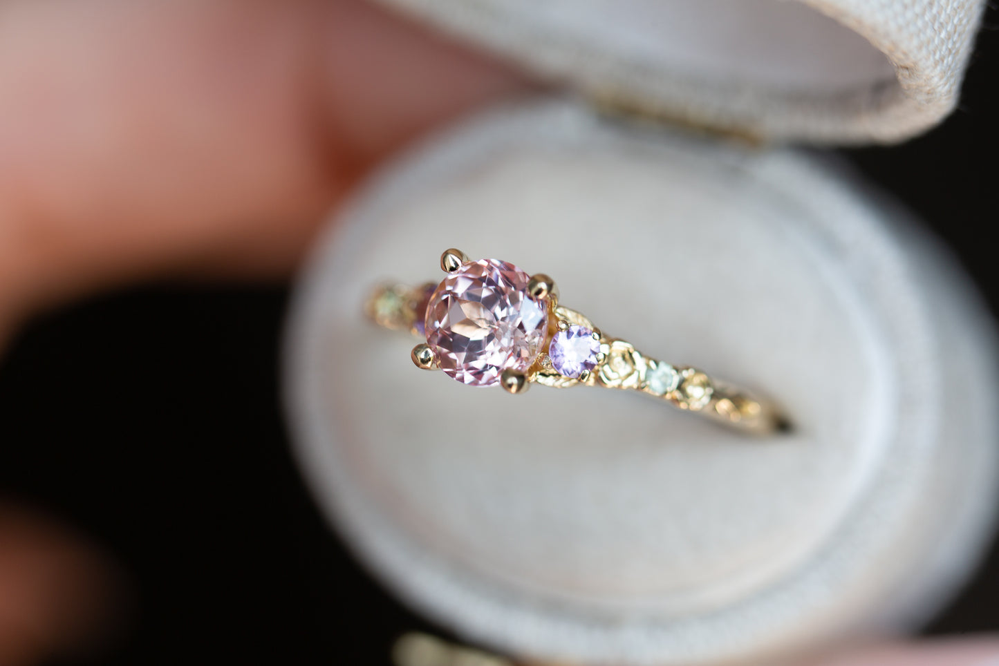 The Rosa setting with lab peach sapphire