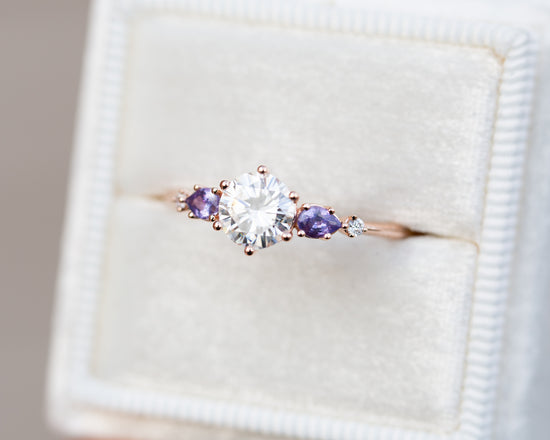 Load image into Gallery viewer, Round moissanite five stone ring with purple sapphires

