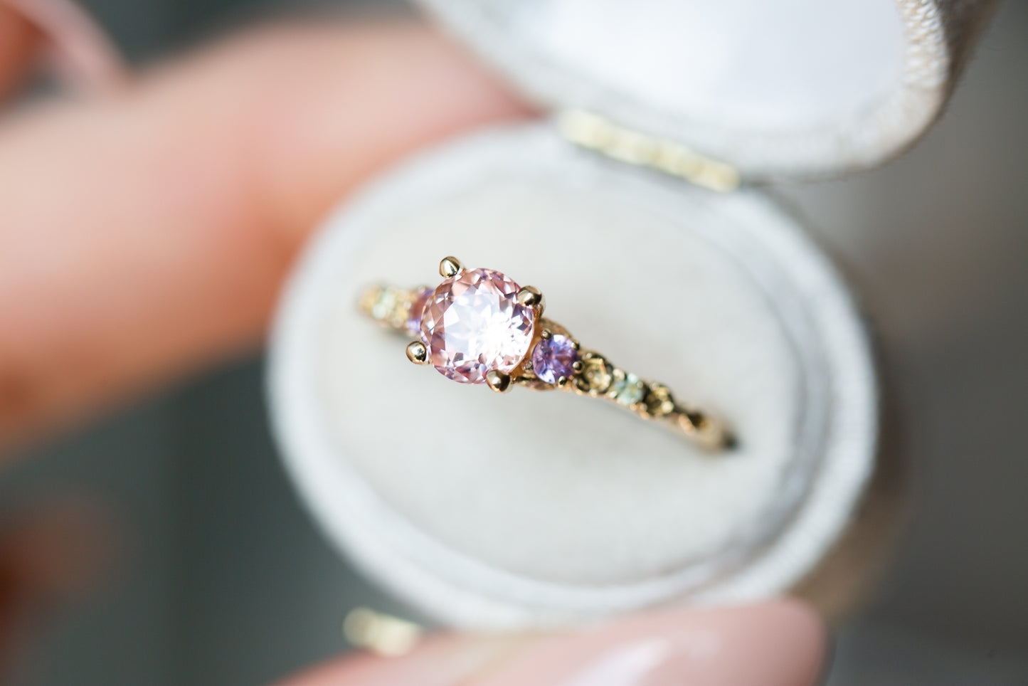 The Rosa setting with lab peach sapphire