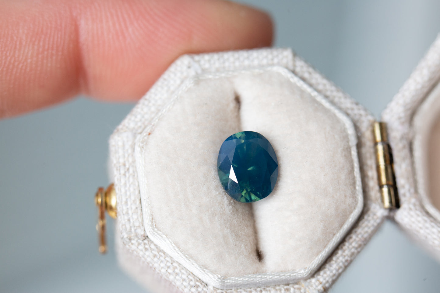 Load image into Gallery viewer, 2.09ct oval blue green opalescent sapphire
