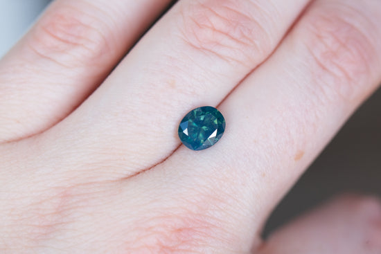 Load image into Gallery viewer, 2.09ct oval blue green opalescent sapphire

