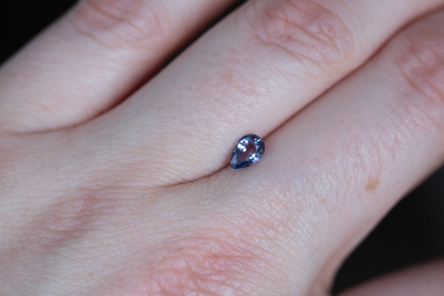 Load image into Gallery viewer, .43ct pear purple/blue sapphire
