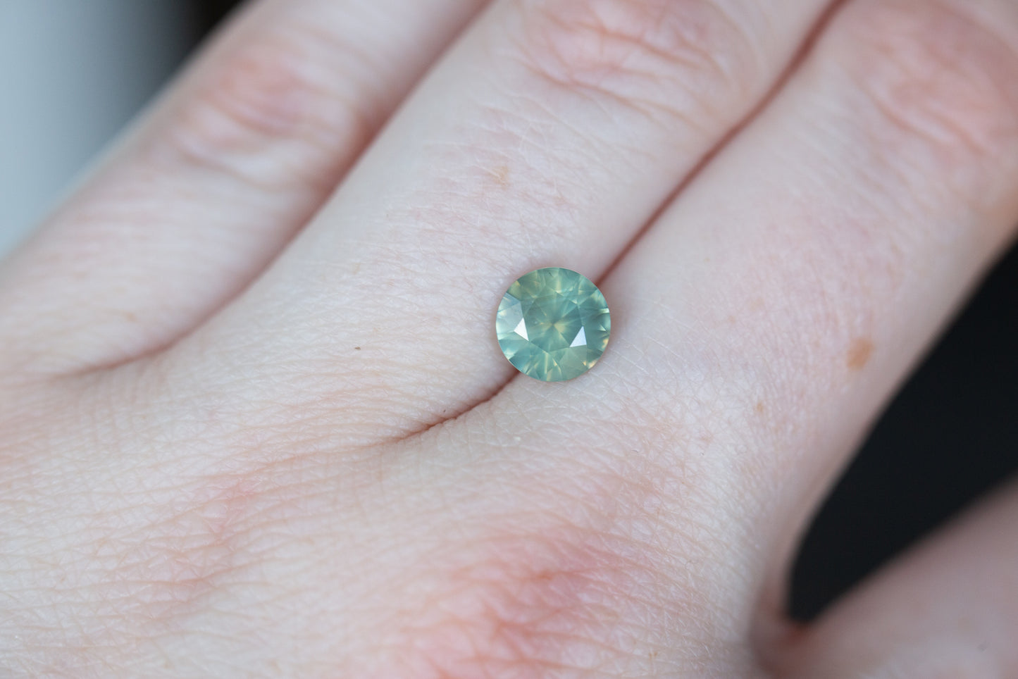 Load image into Gallery viewer, ON HOLD 1.5ct round opalescent light teal sapphire
