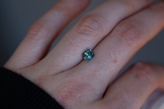 1.23ct blue green emerald cut sapphire