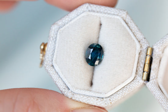 Load image into Gallery viewer, 1.21ct oval dark blue teal sapphire
