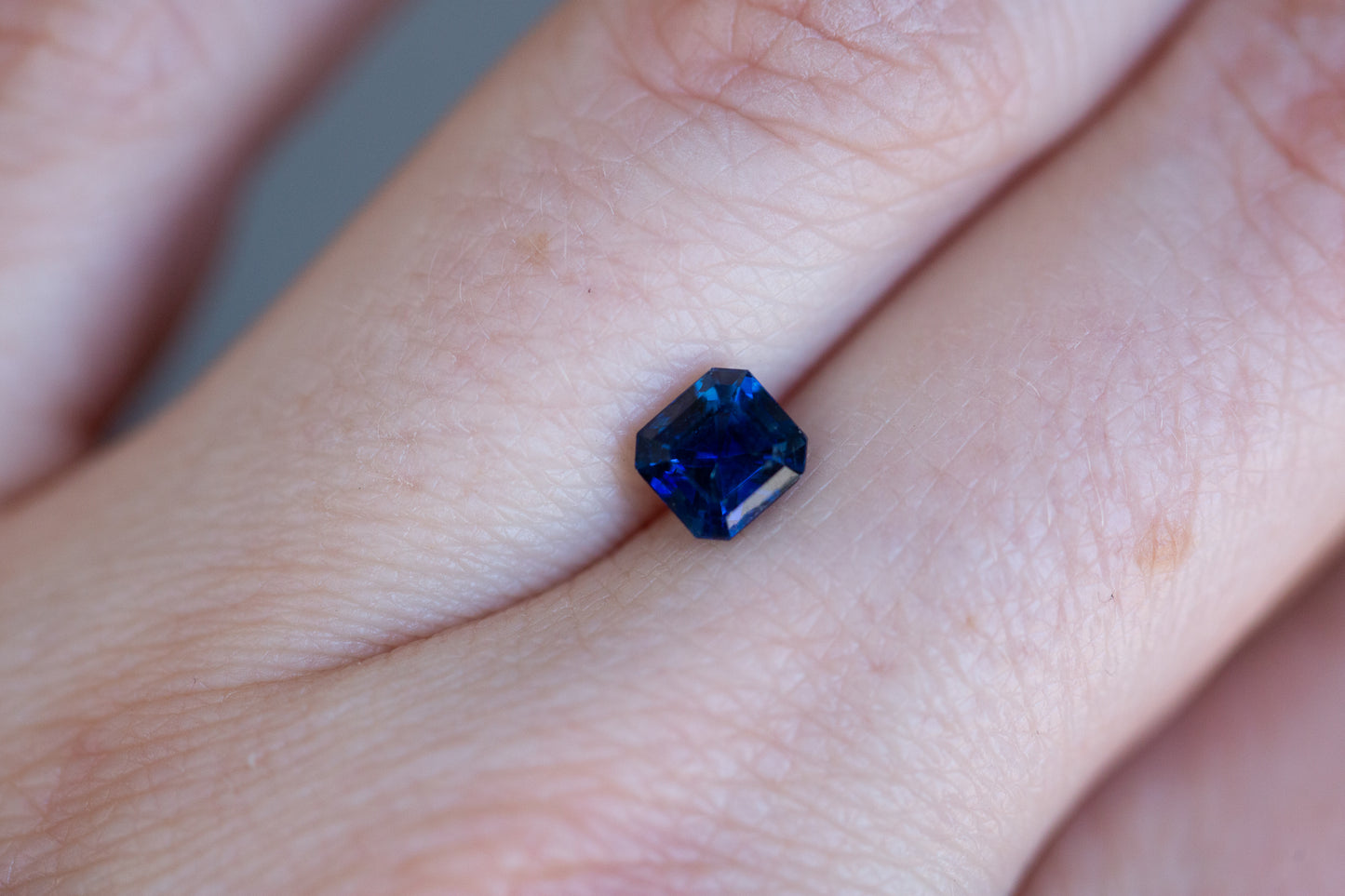 Load image into Gallery viewer, 1.15ct blue emerald cut sapphire
