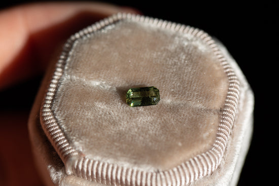 .77ct emerald cut olive green sapphire