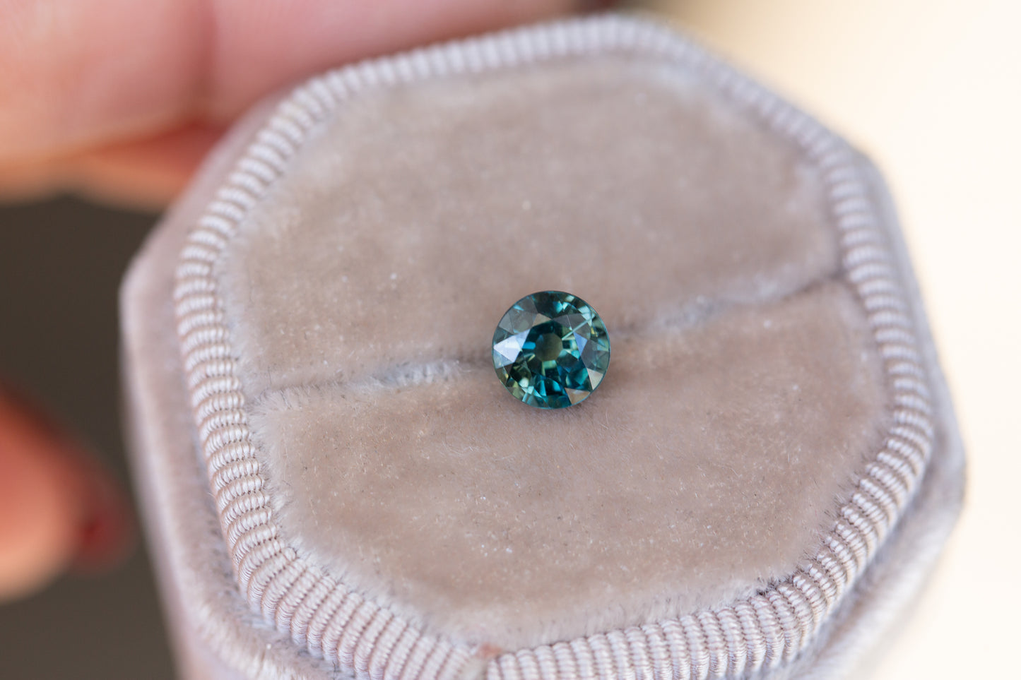 1.5ct round blue green sapphire