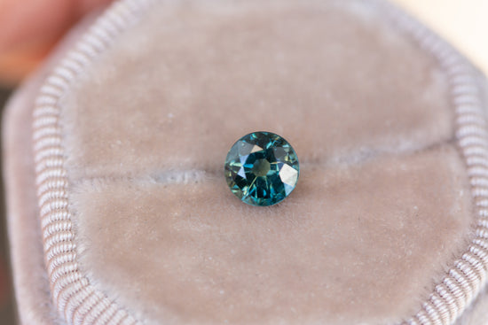 1.5ct round blue green sapphire