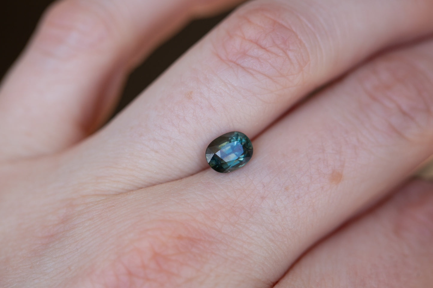 1.61ct oval deep teal blue sapphire