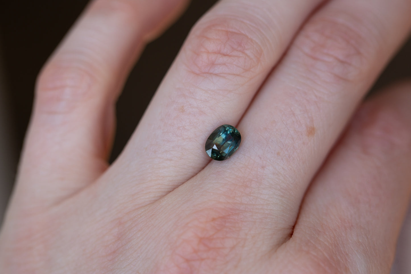 1.61ct oval deep teal blue sapphire