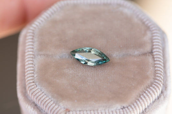 1.47ct deep green marquise sapphire