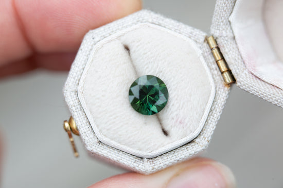 2.2ct round deep green sapphire