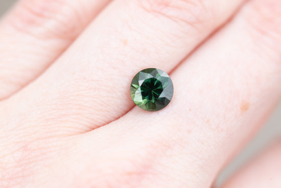 2.2ct round deep green sapphire