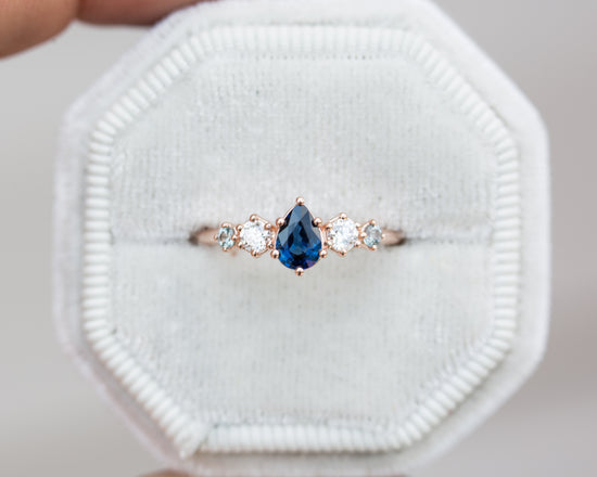 Pear blue sapphire and diamond five stone ring