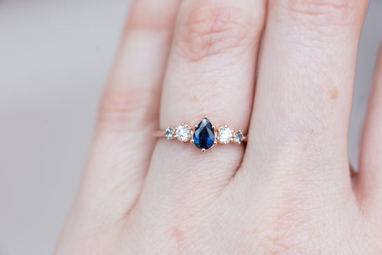 Pear blue sapphire and diamond five stone ring
