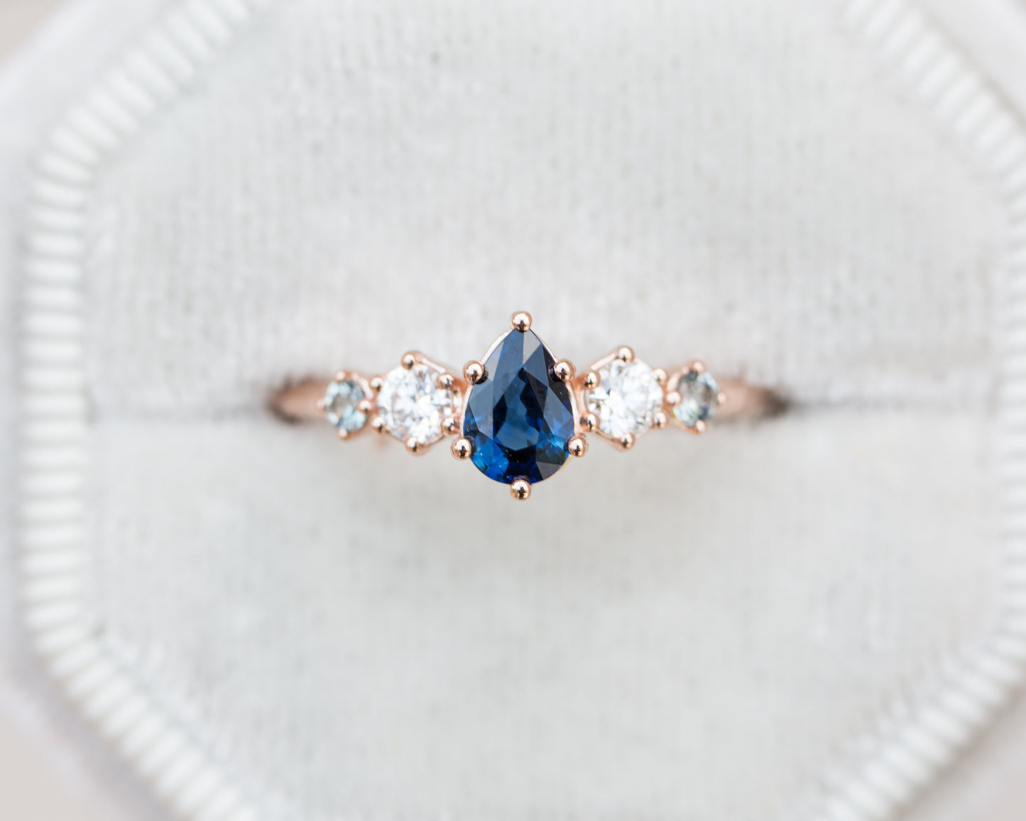 Pear blue sapphire and diamond five stone ring