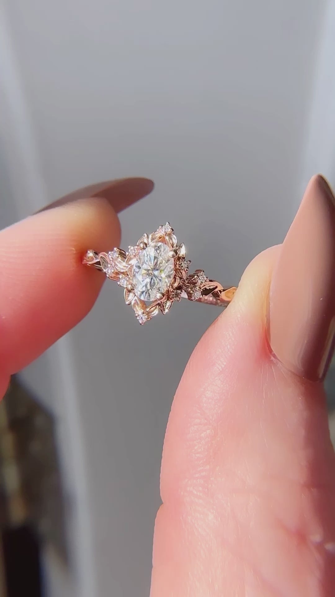 Load and play video in Gallery viewer, Briar rose halo with oval moissanite and diamond accents
