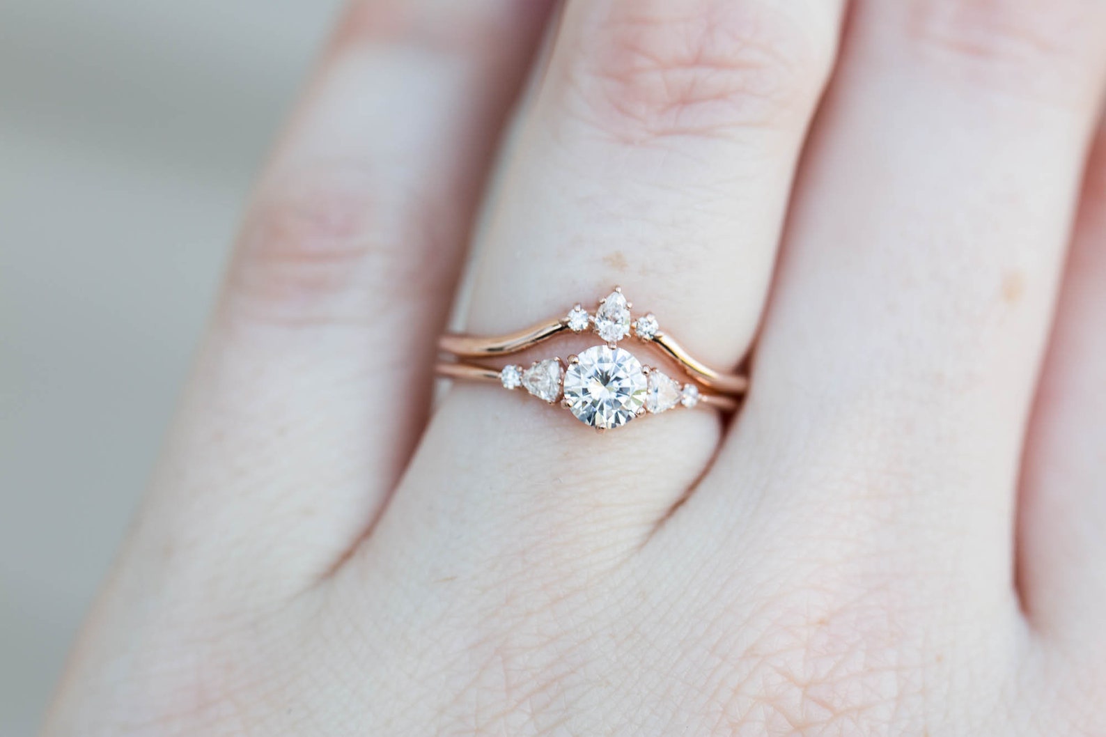 Curved wedding band for pear shaped sales