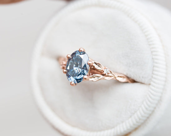 Grey moissanite leaf cathedral ring