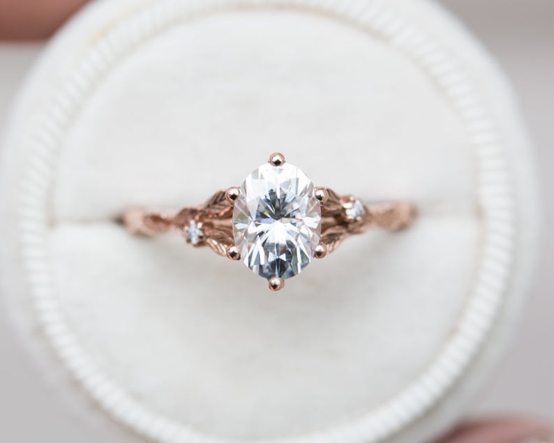 Oval moissanite leaf cathedral ring