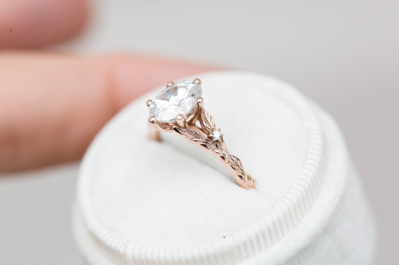 Oval moissanite leaf cathedral ring