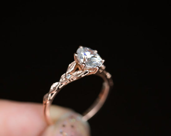 Oval moissanite leaf cathedral ring