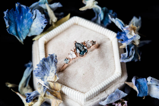 Pear London blue topaz five stone ring