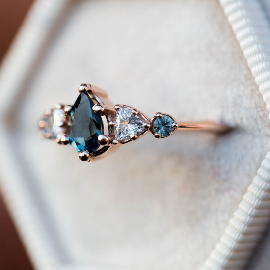 Load image into Gallery viewer, Pear London blue topaz five stone ring
