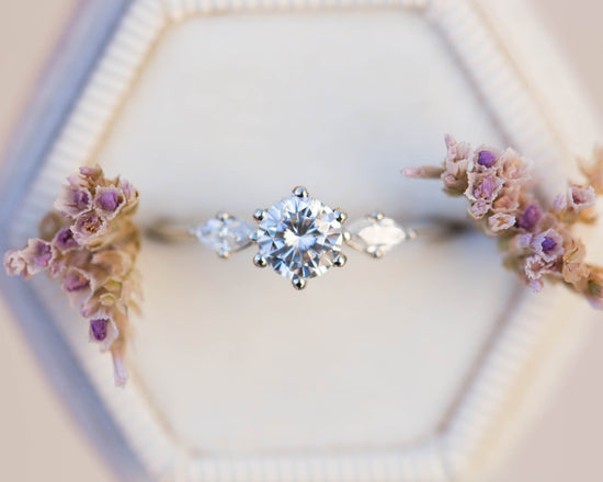 Load image into Gallery viewer, Three stone ring with 5mm round moissanite and marquise side stones
