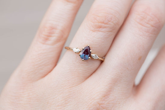 Pear alexandrite marquise three stone engagement ring