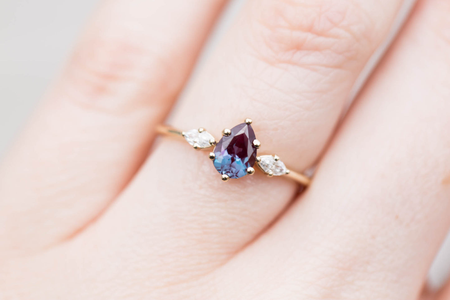 Pear alexandrite marquise three stone engagement ring