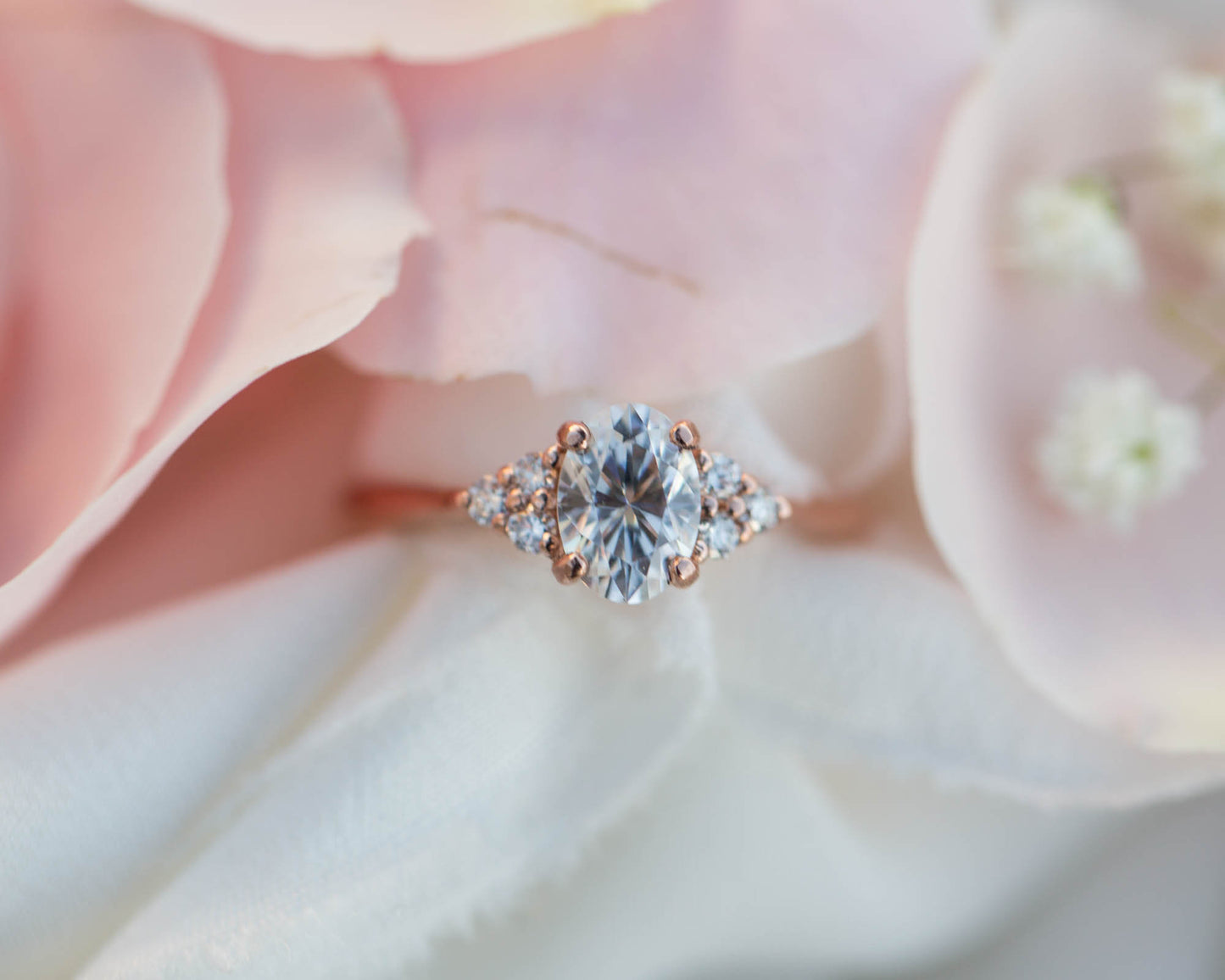 Load image into Gallery viewer, 7x5mm oval moissanite cluster engagement ring
