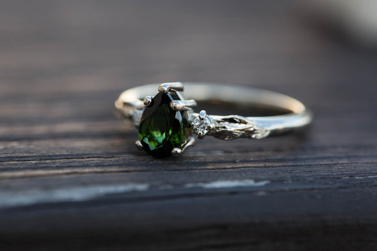 Jo's delicate princess cut green tourmaline engagement ring
